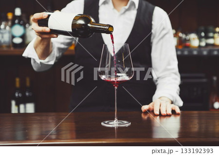Man Pouring Red Wine, Close-up Man Pouring Red Wine, Close-up 133192393