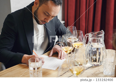 Sommelier degustate wine. Training of restaurant staff, studying alcohol list. Blind wine tasting. Sommelier degustate wine. Training of restaurant staff, studying alcohol list. Blind wine tasting. 133192400