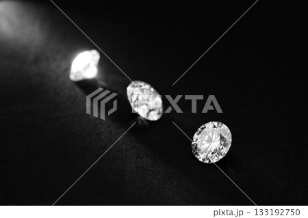 Three diamonds are on a black background Three diamonds are on a black background 133192750