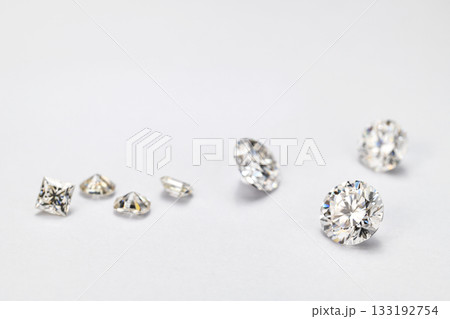 A row of diamonds are displayed on a white background A row of diamonds are displayed on a white background 133192754