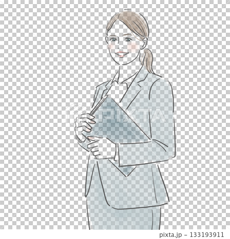 A woman in a suit standing with a smile and holding a document in her hand A woman in a suit standing with a smile and holding a document in her hand 133193911