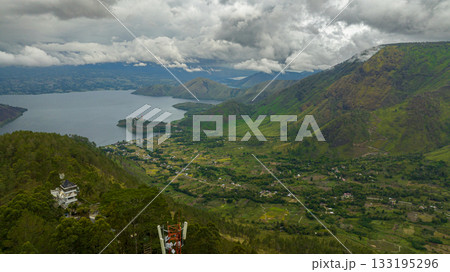 Aerial view of Lake Toba and Samosir island. among the mountains with tropical vegetation. Sumatra, Indonesia. 133195296