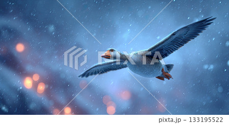 Flying goose in cold snowy weather with blurred lights background 133195522