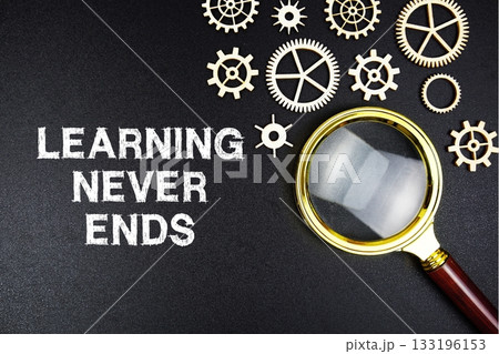 Learning Never Ends text message with magnifying glass on black background Learning Never Ends text message with magnifying glass on black background 133196153
