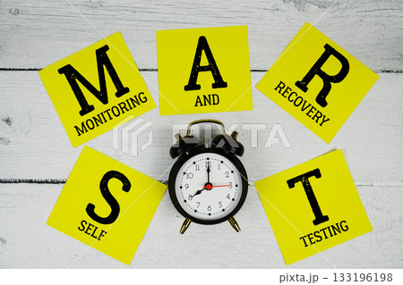 SMART Self Monitoring And Recovery Testing with alarm clock on wooden background 133196198