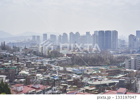 Smog and yellow dust pollution covering cityscape of Seoul capital of South Korea Smog and yellow dust pollution covering cityscape of Seoul capital of South Korea 133197047