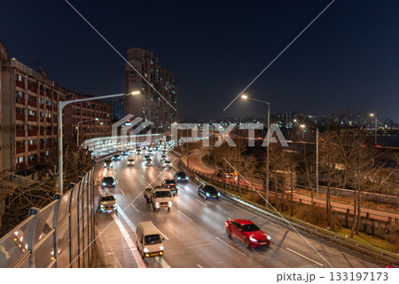Busy urban highway at night in Seoul, South Korea 133197173