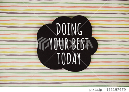 Doing Your Best Today text with speech bubble top view on colorful stripes background Doing Your Best Today text with speech bubble top view on colorful stripes background 133197479