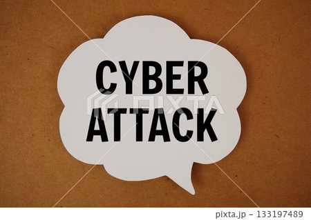 Cyber Attack text with speech bubble top view on yellow background Cyber Attack text with speech bubble top view on yellow background 133197489