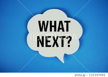 What Next? text with speech bubble top view on blue background 133197493