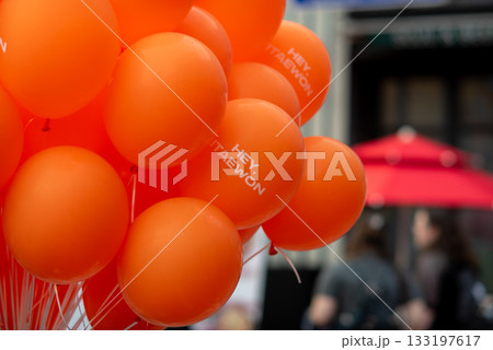 Orange balloons with Hey Itaewon text at an outdoor festival in Itaewon district in Seoul, South Korea Orange balloons with Hey Itaewon text at an outdoor festival in Itaewon district in Seoul, South Korea 133197617