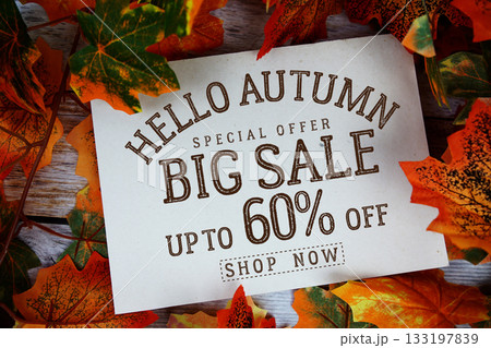 Hello Autumn Big Sale 60% off   Special Offer with maple leaf decoration on wooden background 133197839