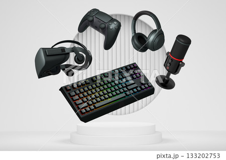 Gaming and streaming accessories including RGB keyboard, headphones, microphone, VR glasses floating above podium Gaming and streaming accessories including RGB keyboard, headphones, microphone, VR glasses floating above podium 133202753