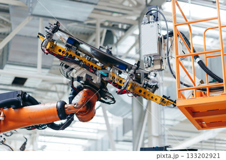 Automotive production line. Robotic Welding car body. Modern car Assembly plant 133202921