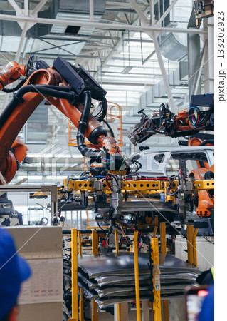 Automotive production line. Robotic Welding car body. Modern car Assembly plant Automotive production line. Robotic Welding car body. Modern car Assembly plant 133202923