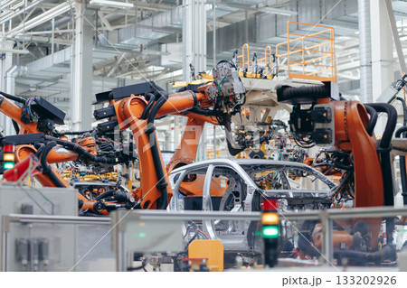 Automotive production line. Robotic Welding car body. Modern car Assembly plant 133202926