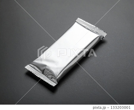 Metallic Bar Wrapper on Dark Background Metallic Bar Wrapper on Dark Background 133203001