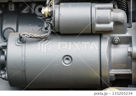 Diesel engine close up, starter detail 133203234
