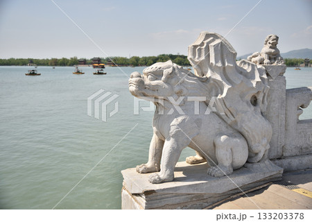 Dragons on Seventeen-Arch Bridge in The Summer Palace, complex of lakes, gardens, pavilions and palaces in Beijing, China Dragons on Seventeen-Arch Bridge in The Summer Palace, complex of lakes, gardens, pavilions and palaces in Beijing, China 133203378