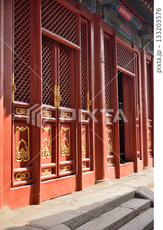 Ornate architecture of the Yonghe Temple of Tibetan Buddhism in Dongcheng District in Beijing, China Ornate architecture of the Yonghe Temple of Tibetan Buddhism in Dongcheng District in Beijing, China 133203576