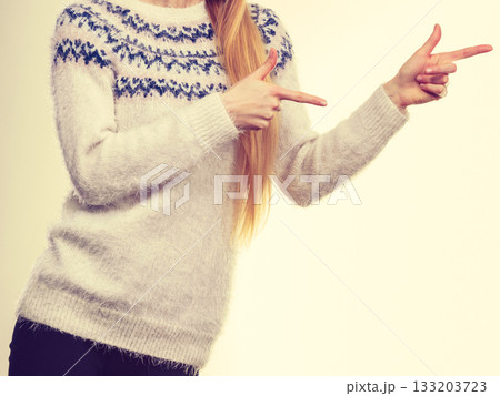Woman legs in black trousers and furry jumper Woman legs in black trousers and furry jumper 133203723
