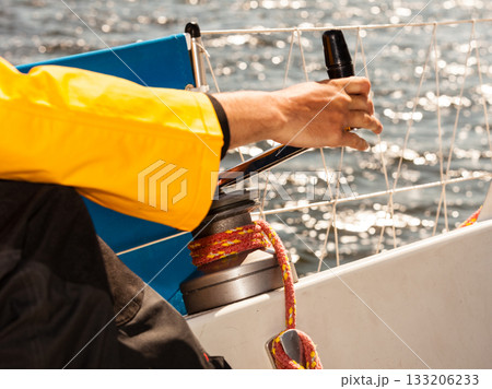 Winch capstan with rope on sailing boat. 133206233