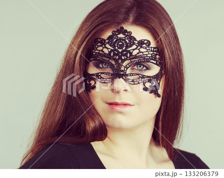 Mysterious woman wearing lace mask Mysterious woman wearing lace mask 133206379