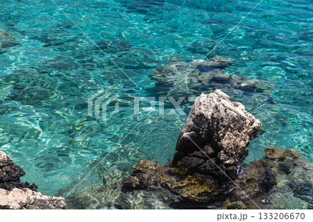 A tranquil coastal scene featuring transparent turquoise water A tranquil coastal scene featuring transparent turquoise water 133206670