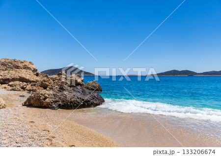 Gerenlik Beach landscape. Serene coastal scene showcasing turquoise water Gerenlik Beach landscape. Serene coastal scene showcasing turquoise water 133206674