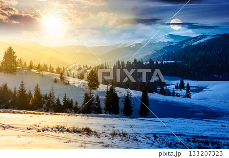 spruce forested hills of mountain ridge in winter. day and night time change concept. gorgeous nature scenery with snow covered hillside and meadows with sun and moon at twilight. equality and shift 133207323