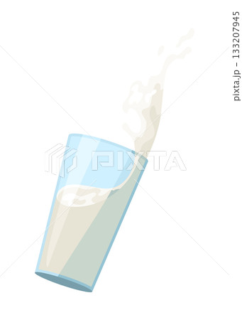 A refreshing glass of milk is currently being poured into a glass A refreshing glass of milk is currently being poured into a glass 133207945