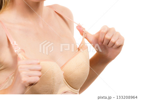 Woman wearing too big bra Woman wearing too big bra 133208964