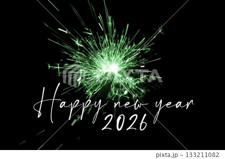 Happy new year 2026 green sparkler new years eve countdown. Luxury entertainment celebration turn of the year party time. Premium nightlife visual with glowing light sparks on dark background. 133211082