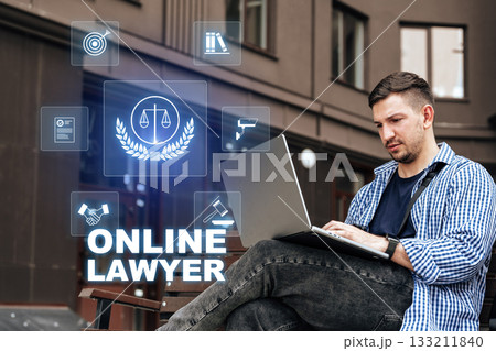 Working online as a lawyer with digital tools in a modern city setting 133211840