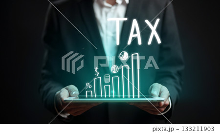 Tax data analysis shown through charts and graphs in a business setting 133211903