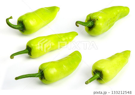 Fresh raw green bell pepper isolated on white background Fresh raw green bell pepper isolated on white background 133212548