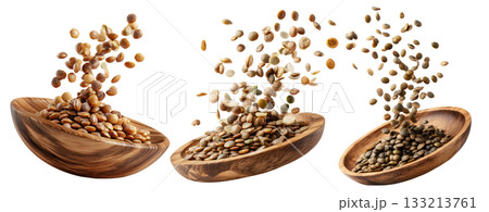 Brown lentils flying from natural wooden bowl, isolated on white transparent background, concept of healthy eating Brown lentils flying from natural wooden bowl, isolated on white transparent background, concept of healthy eating 133213761