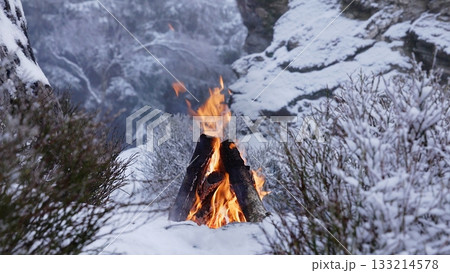 Crackling Campfire in the Winter Foggy Mountains , Harsh Atmosphere , Authentic Place 133214578