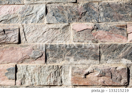 Stone background texture, masonry wall made of rock massif Stone background texture, masonry wall made of rock massif 133215219