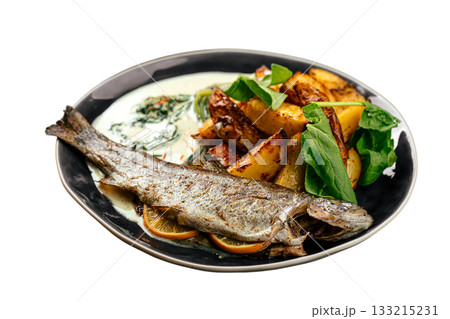 Baked whole trout with potatoes and creamy sauce 133215231