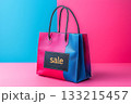 Modern colorful shopping bag with SALE label on vibrant pink and blue background. E-commerce, retail promotion, online discount, fashion sale, digital marketing, Black Friday, Cyber Monday design. Modern colorful shopping bag with SALE label on vibrant pink and blue background. E-commerce, retail promotion, online discount, fashion sale, digital marketing, Black Friday, Cyber Monday design. 133215457