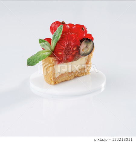 Summer fruits. Seasonal delicious tart against white background Summer fruits. Seasonal delicious tart against white background 133218011