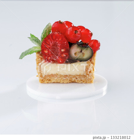 Served, ready to eat. Seasonal delicious tart against white background 133218012