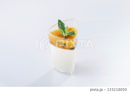 Unhealthy but delicious. Sweet dessert is on the white surface against background Unhealthy but delicious. Sweet dessert is on the white surface against background 133218050