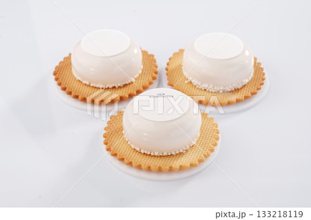 Lot of sugar. Sweet cakes on the white surface 133218119