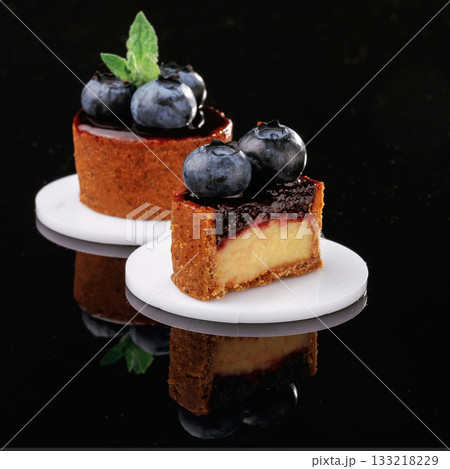Art of cooking. Desserts, sweets on the black background Art of cooking. Desserts, sweets on the black background 133218229