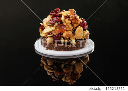 On the black background. Desserts, sweets On the black background. Desserts, sweets 133218252