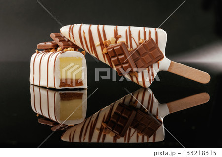Side view. Tasty cheesecakes on the black background 133218315
