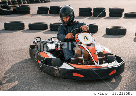 Wellness, free time. Man is outdoors, kart racing conception 133218596