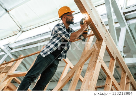 Industrial worker in wooden warehouse Industrial worker in wooden warehouse 133218994